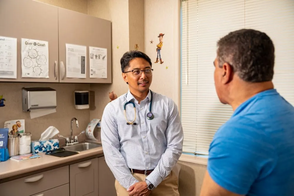 Provider talking to kid patient